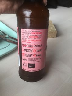 a bottle of beer sitting on top of a table