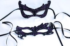 I just love the colors mixed in this beautiful masquerade masks the purple color and the black make the design of the mask stand out and look so elegant. These are  very elegant but yet very comfortable to wear for the long hours of the masquerade parties. I hope you like these masks if you wish them to be all black or any color you to match the clothes for the night please feel free to contact me that will not interfere with the shipping dates or the price.Please take a look at my shop I have a Purple Masks And Prosthetics For Halloween Masquerade, Purple Halloween Masquerade Masks And Prosthetics, Purple Masquerade Mask For Mardi Gras Carnival, Purple Masquerade Mask For Carnival And Halloween, Purple Mask For Costume Party, Purple Eye Mask For Costume Party, Purple Halloween Mask And Prosthetics, Purple Masquerade Mask For Carnival, Purple Masquerade Dress