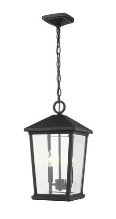 an outdoor hanging light with three lights on the front and back sides, in black