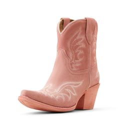 The one you'll wear with everything. Traditional Western stitching pairs nicely with the of-the-moment silhouette and just-right heel. Use it to dress up rolled-up jeans or denim shorts—or pair with the season's flowy skirts. Chandler Western Boot | Product Features : 0 : Non-removable comfort insole, 1 : Duratread™ sole provides maximum wear resistance, 2 : Single stitch welt, 3 : Five-row stitch pattern, 4 : Easy pull-on style | Women's Chandler Western Boots in Carnation Pink Suede Full-grain Pink Ariat Boots, Fitted Boots With Suede Lining For Spring, Fitted Spring Boots With Suede Lining, Arizona Style, Flowy Skirts, Carnation Pink, Rolled Up Jeans, Western Boots Women, Western Boot