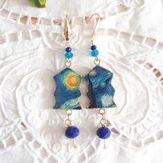 Van Gogh, Starry night, Long earrings with famous painting, art commission preppy jewelry. These earrings represent the famous painting of Vincent Van Gogh "The Starry night". They belong to the art commission/museum collection and they are totally handmade in resin and paper. These are pendant  preppy earrings in the tone of blue and gold and could be a All Museum jewels are lightweight and unique. They identify your personality, while representing your passions. EARRINGS ALSO AVAILABLE WITH CL Artistic Enamel Earrings, Artsy Blue Earrings With Artistic Design, Artsy Blue Art For Collection, Resin And Paper, Preppy Earrings, Gogh The Starry Night, Preppy Jewelry, The Starry Night, Starry Night Van Gogh