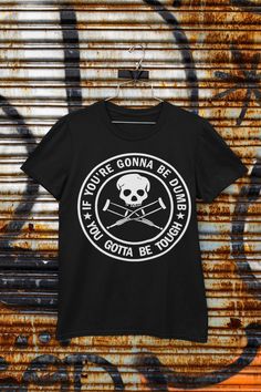 a black t - shirt that says, you're gonna be tough and not goth