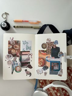 an open book with pictures on it next to some scissors and other things in the background