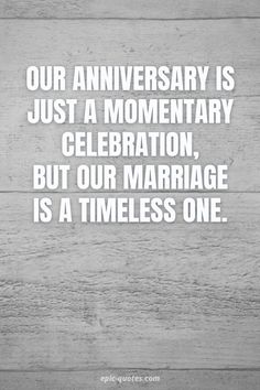 a wooden wall with the words our anniversary is just a moment celebration, but our marriage is