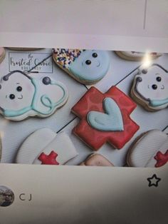 some decorated cookies on top of a computer screen