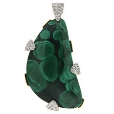 Two gems merge into one in this pendant. Azurite is a dark blue, often opaque gem. Malachite is prized for its banded greens. They both form in copper rich earth, sometimes in the same location, becoming a single rock. Here, malachite appears as concentric spots within the azurite. The gem is specially cut into a bean shape an accented with pave set round brilliant cut diamond triangles. Bars of 18k yellow gold also support the azurite malachite. Measurement details - width 1.13 inches (29 mm), Antique Diamond Necklace, Diamond Gold Pendant, Green To Blue, Pearl Drop Necklace, David Webb, Malachite Jewelry, Azurite Malachite, Vintage Necklaces, Modern Necklaces