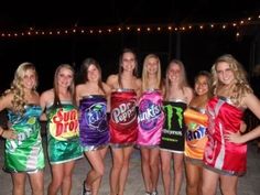 a group of young women standing next to each other in bathing suits and holding soda cans