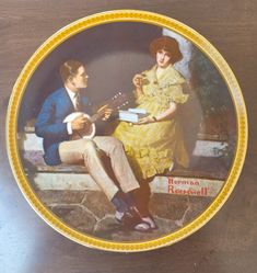 an old photo of a man and woman sitting on a bench playing the ukulele