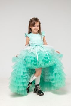 Mint Tutu Dress, Ombre Tulle Dress, Tiered Girl Dress Girl Party Mint Ombre Assymetrical tutu tiered dress with detachable train. This dress can be used as flower girls dress or for any special event. Girl multilayered tiered dress has satin top part and detachable bow Tutu high low dress is perfect for any special occasion in life of your daughter - birthday, party, wedding as flower girl and any other event. With this dress your daughter will receive many compliments and such trendy look will Whimsical Ruffled Pageant Dresses, Whimsical Ruffled Dresses For Pageants, Green Summer Pageant Dress, Spring Birthday Gown With Ruffles, Summer Pageant Gown With Ruffles, Green Summer Dress For Pageants, Green Tulle Birthday Dress, Green Tulle Dress For Birthday, Green Whimsical Dress For Birthday