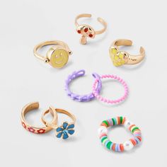 The Girls' 8pk Smiley Flip Ring Set - art class™ merges playful aesthetics with contemporary style. This set features a range of designs, from endearing hearts and cheerful smileys to elegant flowers and more, ensuring a diverse selection for every mood and occasion. The girls' 8pk smiley flip ring set from art class™ is easy to mix and match with various outfits. art class™: One-of-a-kind looks for the one and only you. Flip Ring, Dark Rings, Multi Ring, Clothing Design Sketches, Brass Band, Bracelet Ideas, Cross Ring, Clothing Design, Elegant Flowers