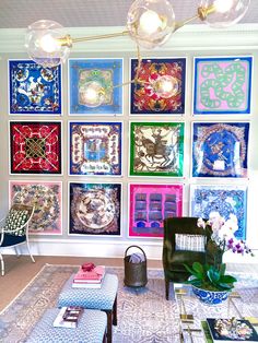 a living room filled with lots of colorful art