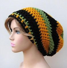 a mannequin head wearing a multicolored crocheted beanie hat