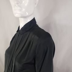 "by Kristin, black blouse with hidden buttons panel and front pleats. Fits Medium 19\" across 23\" long 23\" sleeves * Please review all shop policies before completing transaction. All sales final. No returns or exchanges. * Bundle up for combined shipping. * Instagram @vintagerunsdeepshop" Elegant Collared Pleated Blouse, Elegant Pleated Collared Blouse, Formal Fitted Blouse With Pleated Sleeves, Pleated Blouse For Workwear, Elegant Pleated Evening Blouse, Elegant Pleated Blouse For Evening, Fall Classic Pleated Tops, Formal Collared Blouse With Pleated Sleeves, Black Long Sleeve Blouse For Office