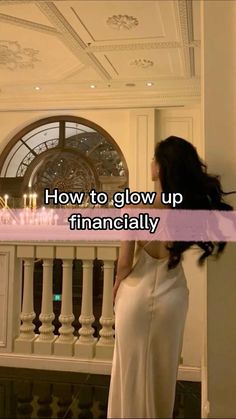 a woman standing in front of a chandelier with the words how to glow up financiallyly