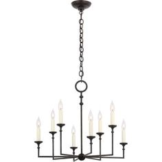 a chandelier with six candles hanging from the bottom and one light on top