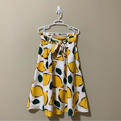 Her Destiny Summer Cool Lemon Print A-Line Skirt -Size Medium -Lemon Print -A-Line Silhouette -Adjustable Self-Tie Waist Strap -Stretchable Waistband -Pleats On Waist -Side Pockets -Approximate Measurements On A Flat Surface: Waist: 14” (Some Stretch) Hips: 23.5” Length: 32” -100% Polyester -Nwt Yellow Pleated Summer Skirt, Yellow Pleated Skirt For Summer, Casual Lemon Print Bottoms For Spring, Casual Bottoms With Lemon Print For Spring, Summer Yellow Skirt For Vacation, High Waist Yellow Skirt For Spring, Yellow Knee-length Relaxed Fit Skirt, Yellow Relaxed Knee-length Skirt, Yellow High-waist Skirt For Spring