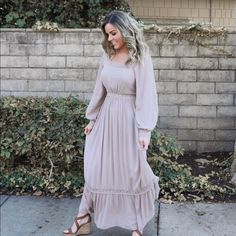 100% Rayon Lining: 100% Polyester Square Neck Lace Detail Full Lining Lace Wrist And Tier Details Invisible Back Zipper Measurements (Approximately): Small: Bust 38”/ Waist 28” Medium: Bust 40”/ Waist 30” Large: Bust 42”/ Waist 32” Modest Beige Maxi Dress, Modest Flowy Beige Maxi Dress, Flowy Beige Modest Maxi Dress, Beige Flowy Modest Maxi Dress, Chic Taupe Maxi Dress For Spring, Modest Beige Maxi Dress For Fall, Prarie Dress, Lilly Pulitzer Maxi Dress, Light Grey Sweater