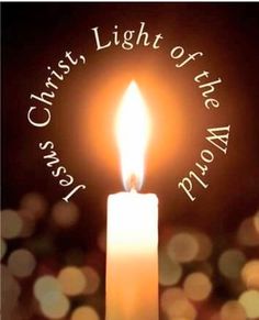 a candle with the words christ, light of the world on it