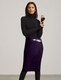 This faux patent leather midi skirt is chic and flattering. Made with commando's signature smoothing waistband and a high-shine, stretch faux patent fabric for a smoothing, sleek look.  Product Details  Fit-tested by real women 62% polyurethane, 36% viscose, 2% elastane; short (78% nylon 22% elastane); lining (100% cotton) Smoothing internal waistband Hits just below the knee USA Constructed  Item SK03 Elegant Shiny Fitted Skirt, Elegant Fitted Shiny Skirt, Fitted Shiny Skirt For Evening, Elegant Shiny Skirt For Night Out, Trendy Fitted Shiny Skirt, Sleek Pencil Skirt For Fall Party, Sleek Midi Skirt For Fall, Fall Sleek Fitted Skirt, Sleek Solid Color Skirt For Fall