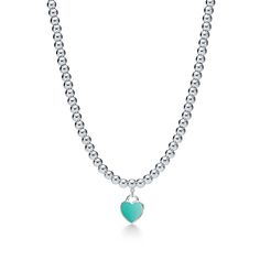 Inspired by the iconic key ring first introduced in 1969, the Return to Tiffany collection is a classic reinvented. A hint of Tiffany Blue® adds the perfect finish to this timeless style. Sterling silver with Tiffany Blue® enamel finish; Beads, 4 mm; On an 18" chain; Instantly recognizable, the signature Tiffany Blue® hue of this design’s enamel finish has been as iconic as the brand itself since its founding in 1837 | Return To Tiffany® Heart Tag Necklace in Sterling Silver with Enamel Finish, Tiffany Key Ring, Tiffany Key, Tiffany And Co Jewelry, All For Me, Heart Pendants, Glitz And Glamour, Heart Tag, Tiffany Jewelry, Skull Jewelry