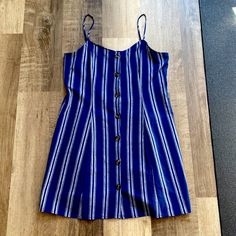 Never Worn! Blue Button Striped Dress! Xl But Fits More Like A L. I Pulled The Tags Off To Wear It But Found Another Dress I Liked Moreexcellent Condition! Blue Vacation Dresses With Button Closure, Blue Beach Dress With Button Closure, Blue Button-up Mini Dress For Vacation, Blue Button-up Summer Dress, Blue Buttoned Summer Dress, Casual Blue Mini Dress With Buttons, Blue Mini Dress With Button Closure For Summer, Blue Mini Dress With Buttons For Day Out, Blue Summer Dress With Buttons