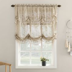 No. 918 Alison Floral Lace Sheer Rod Pocket Window Tie-up Shade is an elegant jacquard lace window tie-up shade with an attractive scalloped bottom and edges for a delicate look. The perfect complement to farmhouse decor, these curtain panels gently filter light while enhancing privacy. Sold as individual panels measuring 58" width by 64" length in color stone. Measure carefully before selecting your desired size and quantity. Rod not included. Machine wash cold on gentle cycle. Use non-chlorine bleach when needed. Tumble dry on low heat. No. 918 64-in Stone Floral Sheer Rod Pocket Single Curtain Panel in Beige | 57033 Tie Up Shades, Balloon Shades, Lace Window, Pocket Window, Bathroom Windows, Lace Curtains, Window Valance, Curtains Window Treatments, Shades Blinds