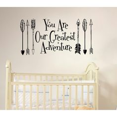 an arrow wall decal with the words you are our greatest adventure and arrows on it