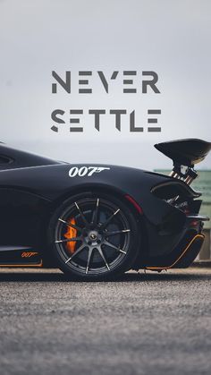 a black sports car with the words never settle on it's side, sitting in front of an airport