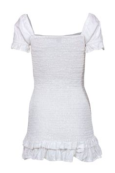 This Faithfull the Brand mini dress is the perfect balance of frilly and feminine. Made with all-over smocking and puff sleeves, this cottage core inspired frock is just the daytime dress necessary for an instagram ready look. Pair with converse and a high ponytail for a cute and youthful weekend look! Size 2 100% Linen Unlined Square neckline Slip on Bodycon silhouette Puff sleeves Bust 22" Waist 21" Shoulder to hem 29" White Ruffled Smocked Top For Brunch, Square Neck Cotton Smocked Dress For Brunch, Square Neck Smocked Cotton Dress For Brunch, Casual Puff Sleeve Dress With Ruffle Hem, Square Neck Smocked Mini Dress For Brunch, Square Neck Smock Mini Dress For Brunch, Fitted Cotton Puff Sleeve Dress With Ruffles, Feminine Fitted Puff Sleeve Dress With Smocked Back, Fitted Puff Sleeve Dress With Smocked Back