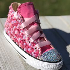 Pink Bedazzled Converse Sneakers, Little Kids Shoe Size 11-3 Information about the shoes All sneakers are Converse brand and have a mix of hand applied high quality glass crystals and resin flat-backs. Please select your color choice by the available drop down options, an option of all glass crystals no color is also available. Converse sizing is unique and sneaker specific. Converse Kids Chuck Taylor All Star Sneakers are expected to run a half-size large. Custom Orders are also available and a Pink Converse Shoes, Beaded Canvas, Bedazzled Converse, Ladybug Tutu, 1st Birthday Tutu, Handmade Tutu, Bling Shirts, Pink Converse, Custom Converse