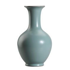 a light blue vase sitting on top of a white table