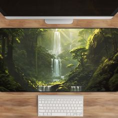 a desktop computer sitting on top of a wooden desk next to a keyboard and mouse