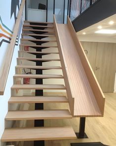 the stairs are made of wood and have no railings