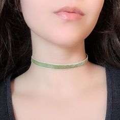 "A light green thin choker featuring glitter velvet ribbon and bronze hardware. The length shown in photos is 12\" and more options are available. Each size comes with an additional 2.5\" extender chain. For best fit, measure around the smallest part of your neck (close to center) and choose the next smallest size. If you would like a different length, send me a message and I can make that for you :) Ribbon clamps, lobster clasp, chain and charms are antique bronze tone alloy. Jewelry Care Tips Glitter Choker, Fairycore Necklace, Green Choker, World Necklace, Velvet Choker Necklaces, Velvet Choker, Victorian Gold, Rose Necklace, Choker Style