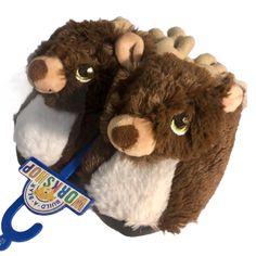 two brown and white stuffed animals with blue handles