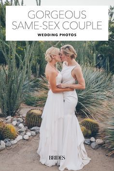 two women in white dresses standing next to each other near cacti and succulents