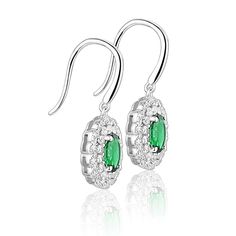 Introducing Zomier Earrings - Emerald, the epitome of elegance and sophistication. These exquisite emerald earrings are perfect for those seeking a touch of luxury. Crafted with utmost precision, the earrings boast a stunning emerald gemstone, renowned for its rich green color and captivating sparkle. The presence of the GTC Certificate ensures its authenticity and purity, adding further value to this masterpiece. With a sleek and timeless design, these earrings effortlessly complement any outfi Emerald Drop Earrings, Emerald Earrings Drop, Timeless Engagement Ring, Engagement Earrings, Lab Created Emerald, Family Jewellery, Sterling Silver Drop Earrings, Luxurious Design, Emerald Earrings