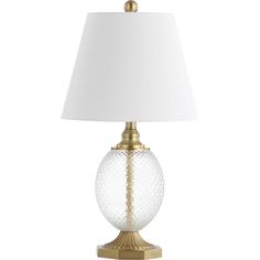 a glass table lamp with a white shade