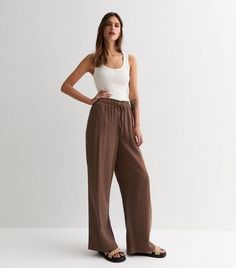 Brown Cotton Wide Leg Trousers | New Look Wide Brown Pants, Brown Wide Leg Pants Outfit, Dark Brown Trousers, Travelling Outfits, Brown Wide Leg Pants, Black Linen Trousers, Maternity Trousers, Fabric Matching, Basic Wardrobe