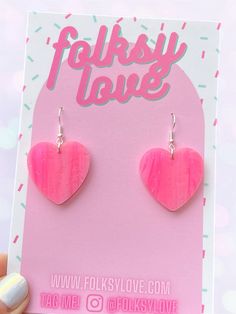 Original design, laser cut acrylic earrings on nickel free posts. Trendy Pink Heart Earrings For Gift, Trendy Pink Heart Earrings As Gift, Cute Pink Earrings With Heart Print, Cute Pink Heart Print Earrings, Handmade Pink Heart Earrings For Valentine's Day, Trendy Pink Heart Print Earrings, Laser Cut Acrylic, Pink Hearts, Free Post