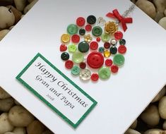 a christmas card with buttons on it