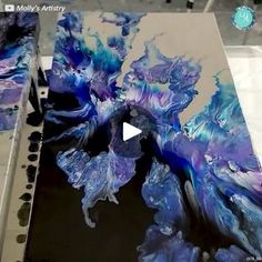 an abstract painting is being worked on in this video by the artist's studio