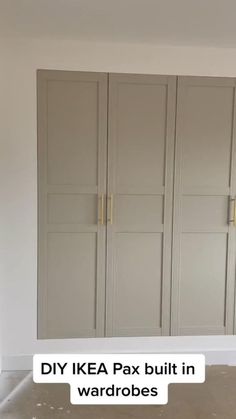 an empty room with some white cabinets in it and the words diy ikea pax built in wardrobes