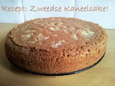 a cake that is sitting on top of a wooden table with the words recipe zwedase kaneebake