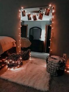 a bedroom decorated with lights and pictures on the wall