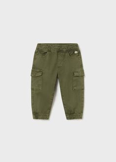 Introduce your little one to the world of luxury with the Mayoral Baby Joggers. Crafted from a blend of 97% cotton and 3% elastane, these jogger pants offer supreme comfort and style. The deep forest color adds a touch of sophistication and is perfect for the cooler seasons. With convenient pockets, these joggers are a must-have for your little man's wardrobe. Boys Leggings, The Smurfs, Zara Australia, Baby Jogger, Cargo Joggers, Dark Khaki, Men's Wardrobe, Cargo Jeans, Cargo Trousers