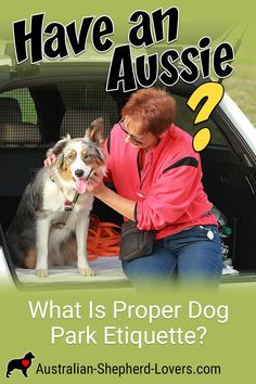 a woman petting a dog in the back of a pick up truck with an advert