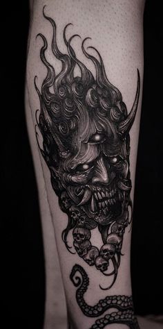 a man's leg with a tattoo on it