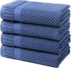 four blue towels stacked on top of each other