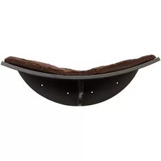 a black shelf with a brown fur lining on the top and two holes in the bottom